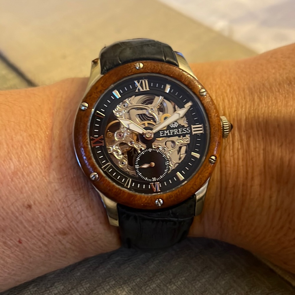 Empress Victoria watch blue face + strap silver and gold skeleton brown dial.